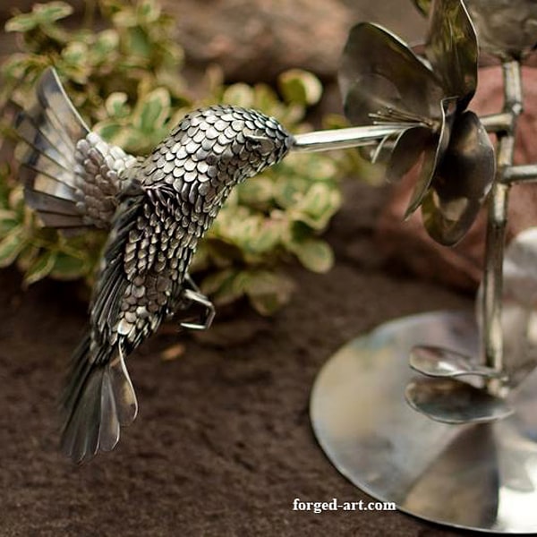 Handcrafted hummingbird sculpture - stainless steel
